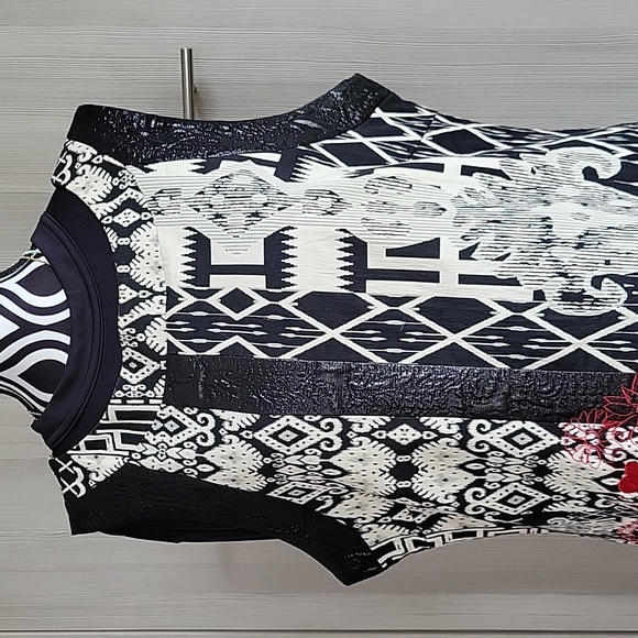 Desigual dress with eclectic pattern, pop of red, and artistic design - Picture 2 of 11